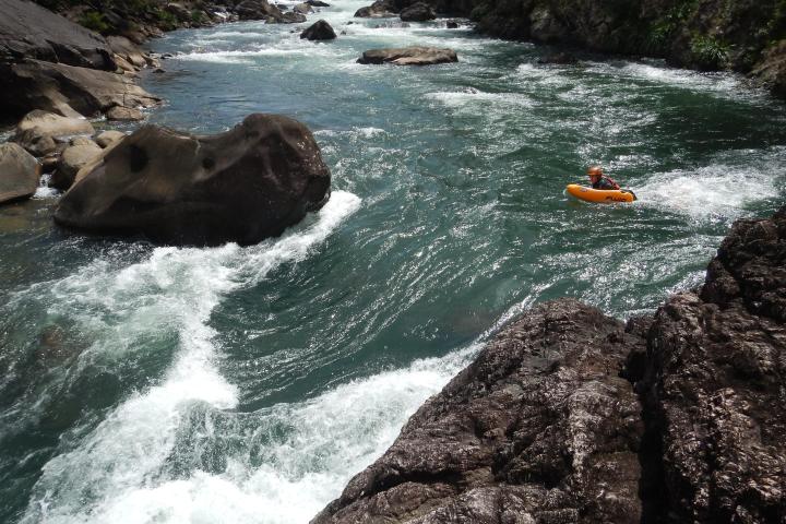 a person enjoying and having fun Barron Riverboarding cairns waterfalls